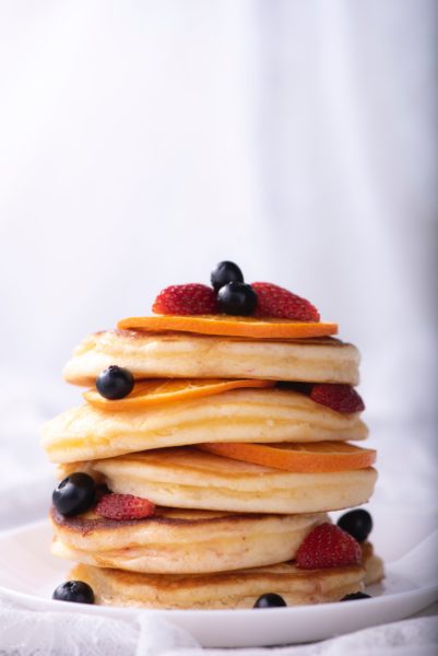 stack of pancakes and fruit for our dining services page